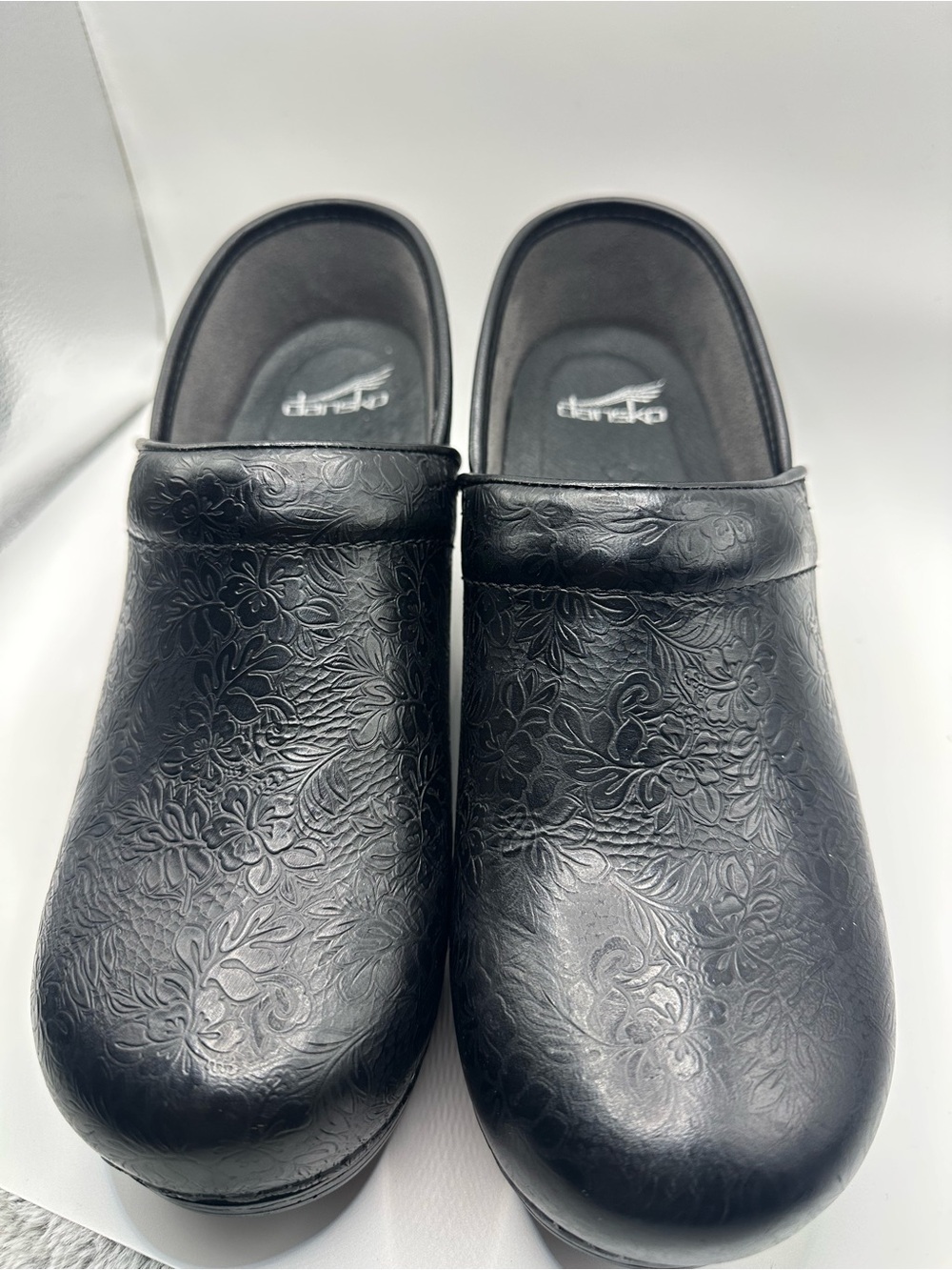 Dansko Black Leather Slip-On Clogs